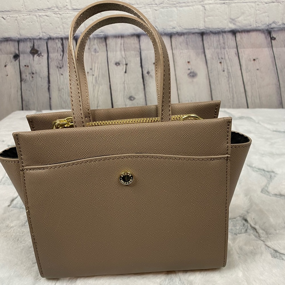 Small Steve Madden hand purse. Tan, taupe color.
